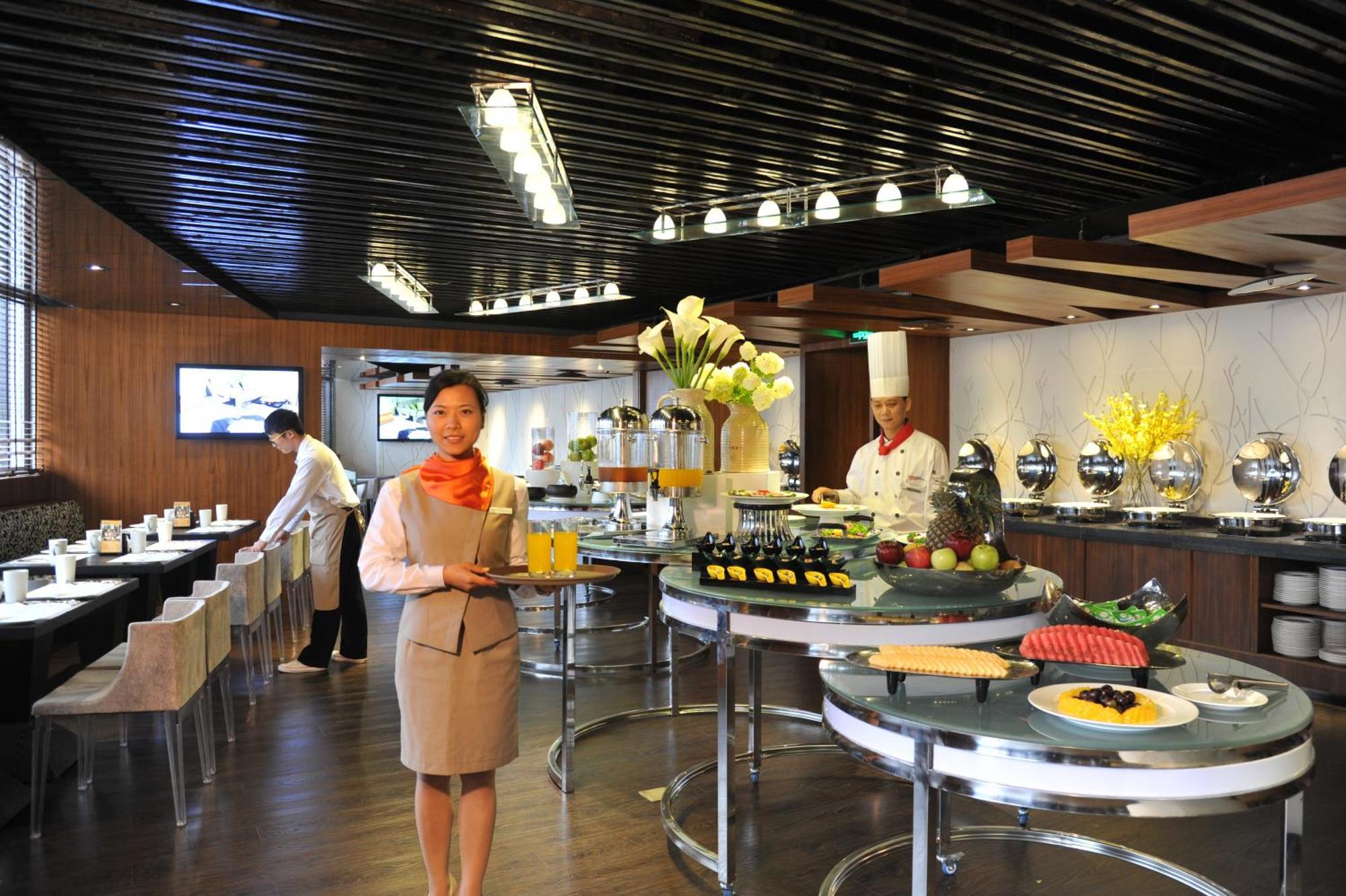 重庆江北观音桥高悦酒店地铁站店 Eksteriør billede